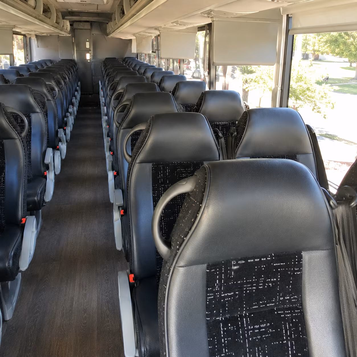 plano 56 passenger charter bus inside