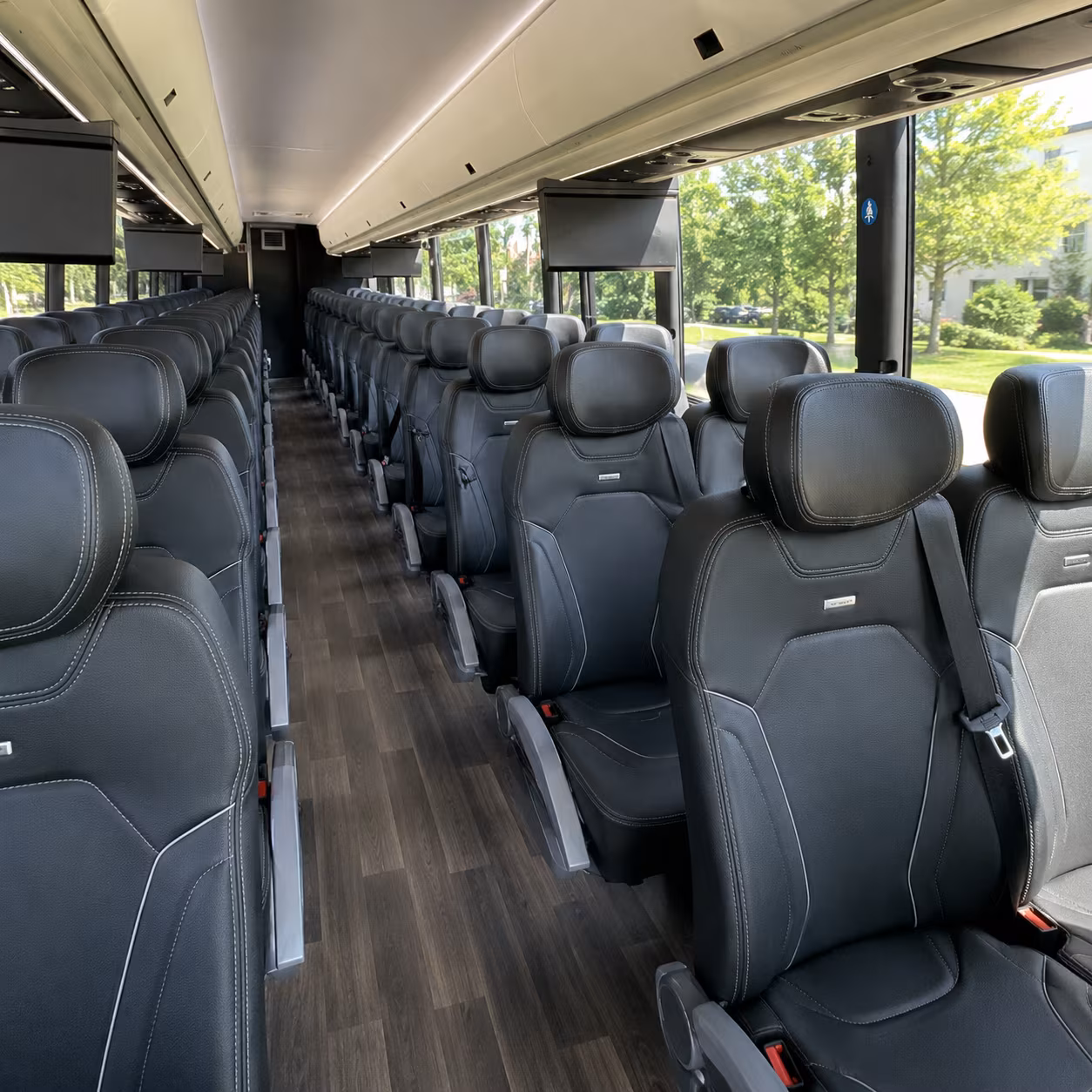 plano charter bus rentals for corporate retreats and business travel